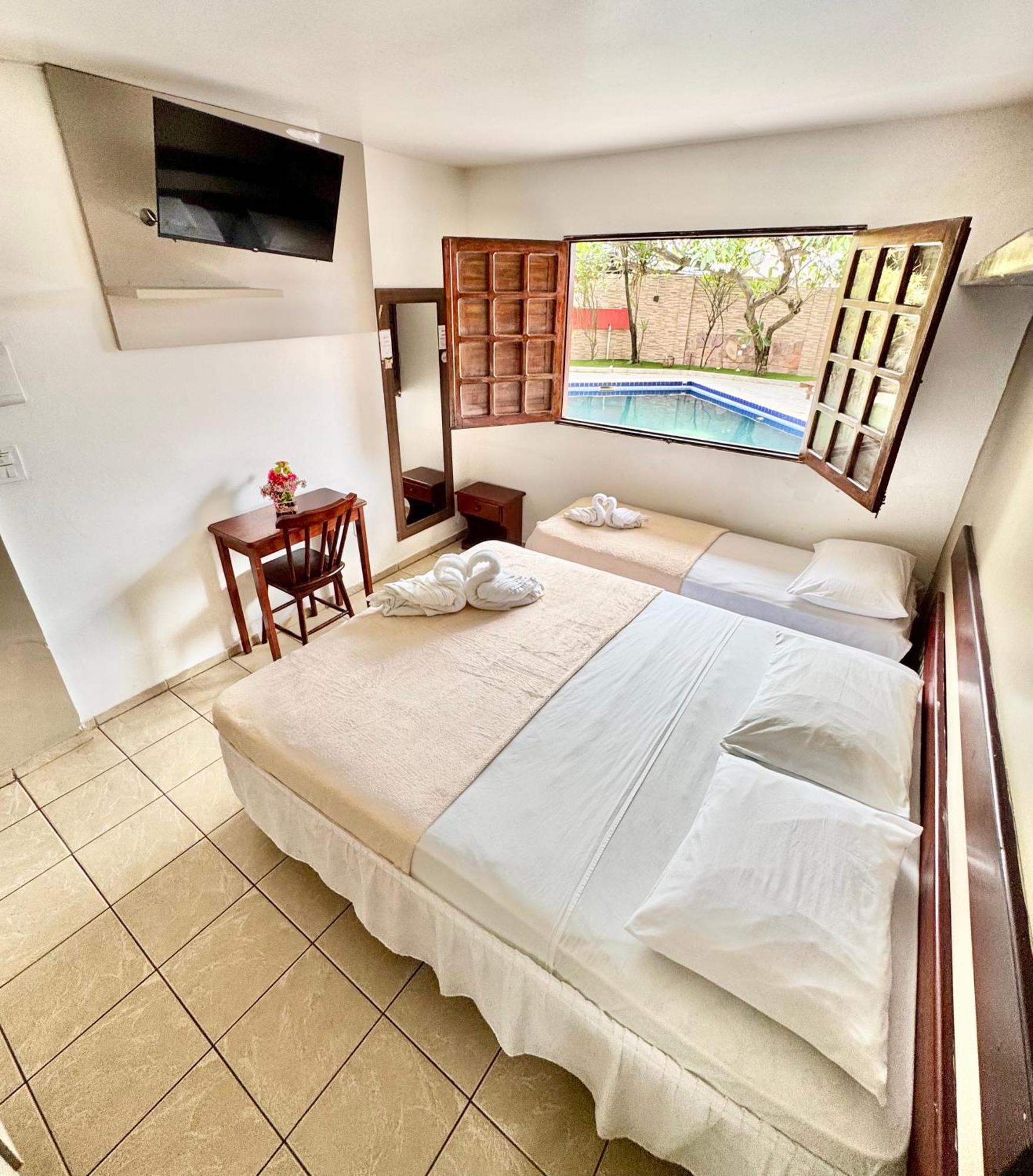 Quarto Família com Vista para o Jardim